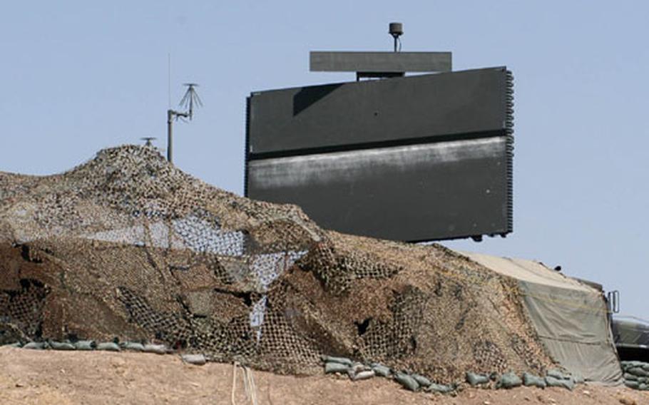 The TPS-75 surveillance radar used by the 606th Air Control Squadron from Spangdahlem Air Base, Germany, to track aircraft in Iraq stands on a hill top above the squadron&#39;s compound at Kirkuk airfield, Iraq.