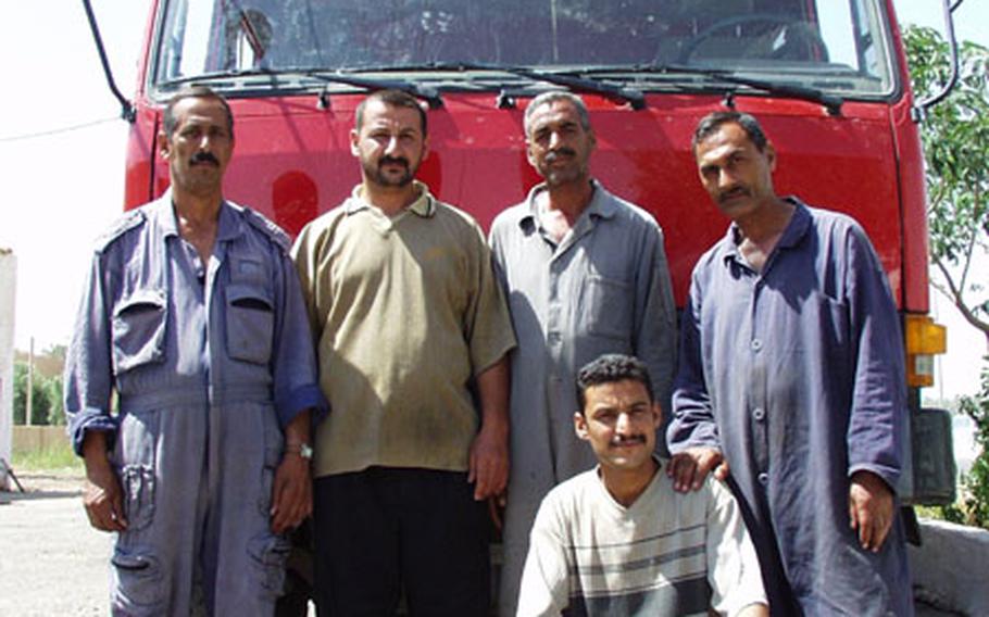 Members of the Al Baya Fire Station in Baghdad, from left: Ibrahim Awad, Mushtak Fadhil, Ahmad Attyah, Hussain Khallil and Mohamed Swadi. The firefighters are still working, without pay, fire suits or enough trucks.