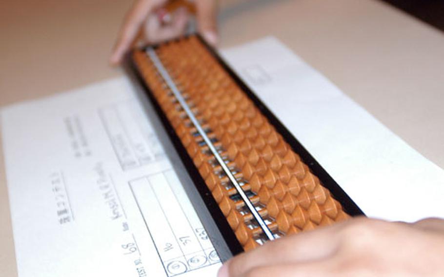 A close up view of a sorobon, or abacus, used by DODDS students to calculate complex mathmatical equations. DODDS students learn the sorobon through the host nation program at elementary schools.