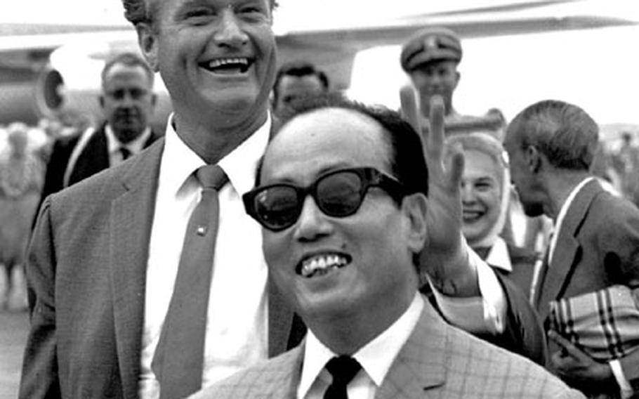 Red Skelton's welcoming committee at the Tokyo airport included Japanese entertainer Junzaburo Ban, foreground.