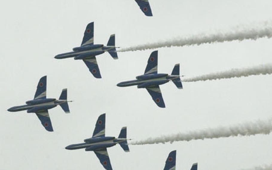 The Japanese Air Self-Defense Force&#39;s Blue Impulse Jr. aerial demonstration team perform some eye catching manuevers at the Misawa Airfest held at Misawa Air Base.