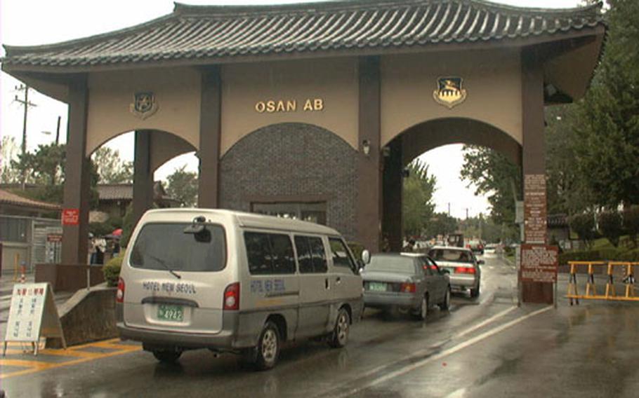 View of Main Gate entrance to Osan Air Base, South Korea. The Air Force will start a year-long construction project later this month to upgrade security at three base gates.