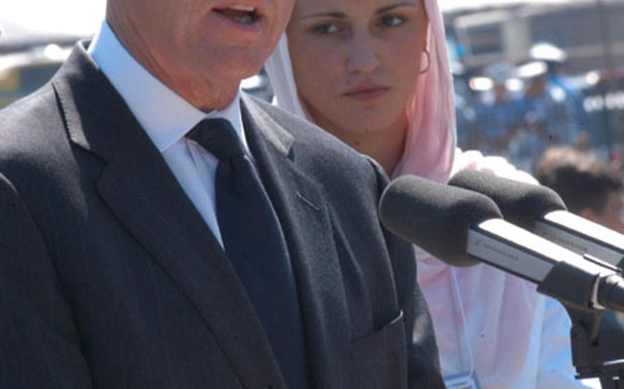 Former President Clinton speaks at the opening of the memorial center dedicated to the more than 7,500 Bosnian Muslims killed after Bosnian Serbian military forces overran the U.N.-protected haven of Srebrenica, Bosnia and Herzegovina, on July 11, 1995. Next to Clinton is Advija Ibrahimovic, representative of the surviving families, who was only 10 years old when she lost most of her family. Mothers of Srebrenica, an association of survivors, invited Clinton to open the memorial that serves as a place for survivors to pray for their loved ones who were killed more than eight years ago, when the war in Bosnia was raging.