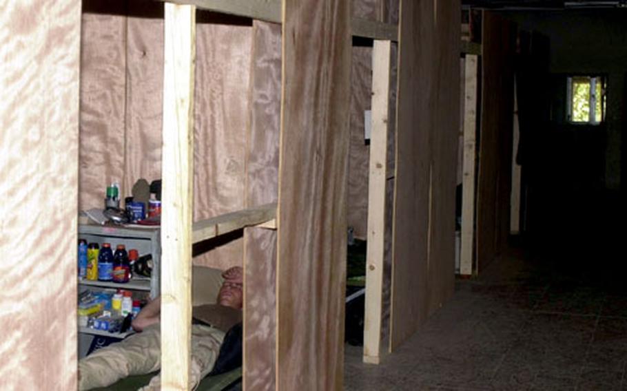 A fresh shipment of plywood allowed one 1st Armored Division platoon to create 2-man rooms inside the storage bay they were living in.