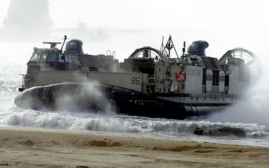 A Land Craft Air Cushion, or LCAC, lands on the beach at Naval Station Rota, Spain on Wednesday.