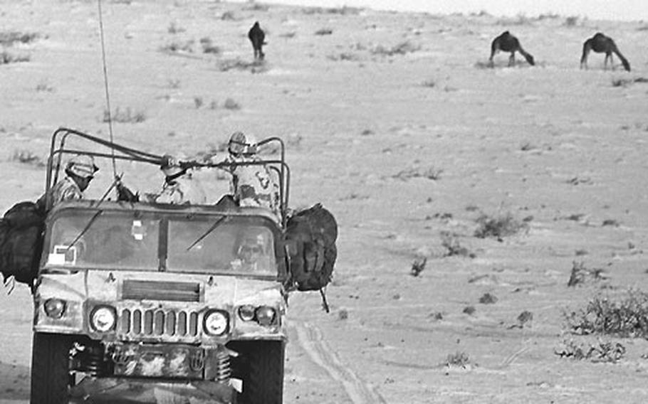 On patrol in the Saudi desert, December, 1990.