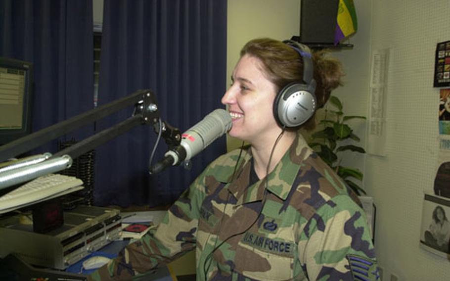 Staff Sgt. Stephanie Csornok, non-commissioned officer-in-charge of radio for American Forces Network at Misawa Air Base, Japan, beat out thousands of other entrants to win the Defense Department&#39;s 2003 voting slogan contest. She penned, "It&#39;s Your Future, VOTE For It."