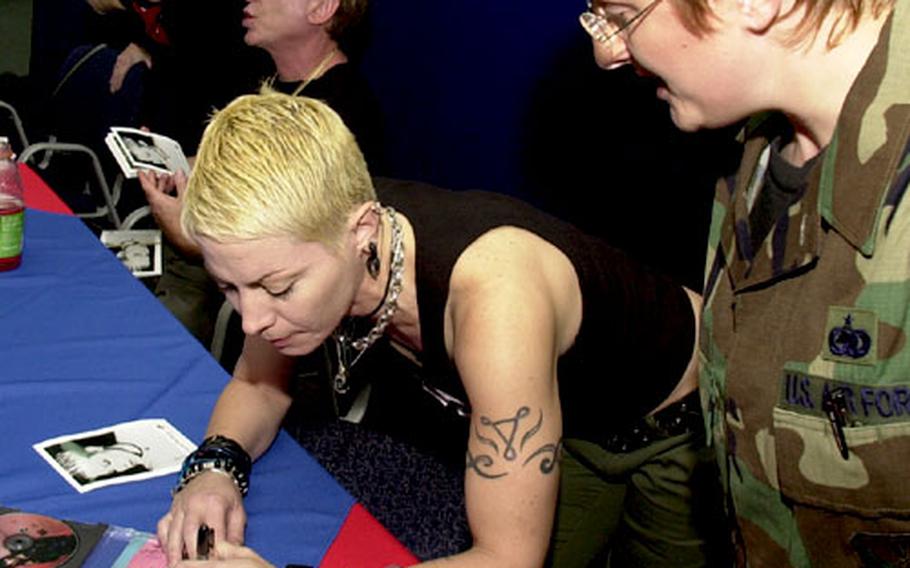 Tech. Sgt. Lynette Cain was among dozens of fans who turned out at Yokota Air Base&#39;s base exchange Tuesday afternoon to get Joan Jett&#39;s autograph.