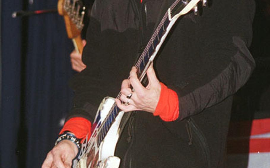 Joan Jett jams during a free concert Tuesday night for Yokota.