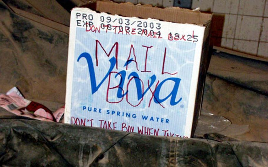 A makeshift mailbox sits in a warehouse where the 372nd Military Police Company, a reserve unit from Cumberland, Md., lives in Hillah, Iraq.
