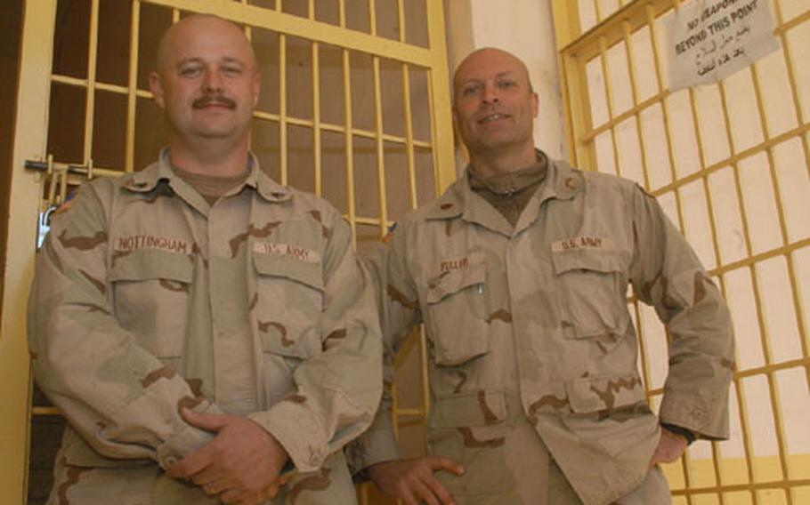 U.S. soldiers in Mosul, Iraq, worked with Iraqis to open the Transportation Jail for pretrial detainees last month. Staff Sgt. Rick Nottingham, left, and Maj. Scott Fuller, U.S. military liaisons with the jail administration, are with the 156th military police company detachment from Logan, W. Va., part of the 503rd MP battalion assigned to the 101st Airborne Division&#39;s 2nd Brigade.