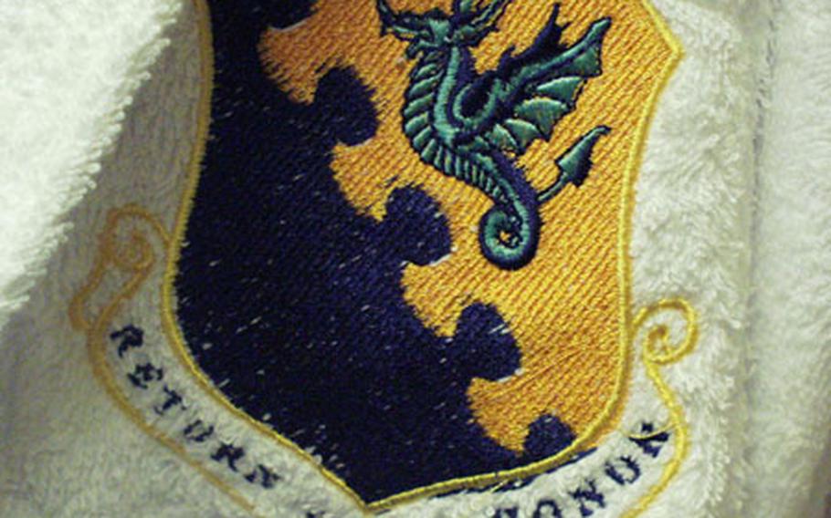 There are a few perks in the "distinguished visitors" suites at the Mountain View Lodge, such as these robes — with the emblem of the 31st Fighter Wing sewn on — that come with the rooms. There are six such suites in the facility. They even have dishwashing machines.