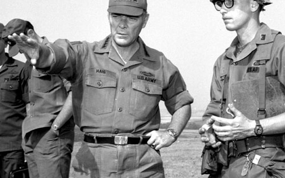 Gen. Alexander M. Haig, Supreme Allied Commander, Europe, visits with U.S. troops at training Area M, near Schweinfurt, Germany, in August, 1976.