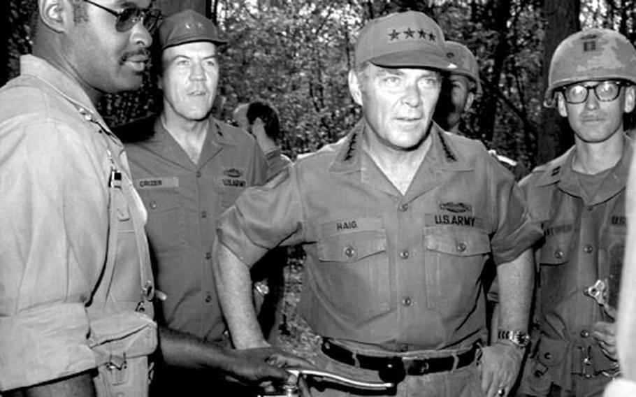 Gen. Alexander M. Haig, Supreme Allied Commander, Europe, visits with U.S. troops at training Area M, near Schweinfurt, Germany, in August, 1976.