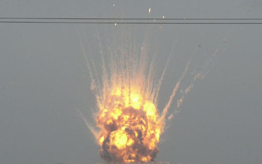 Seventy tons of Iraqi ordnance explode.