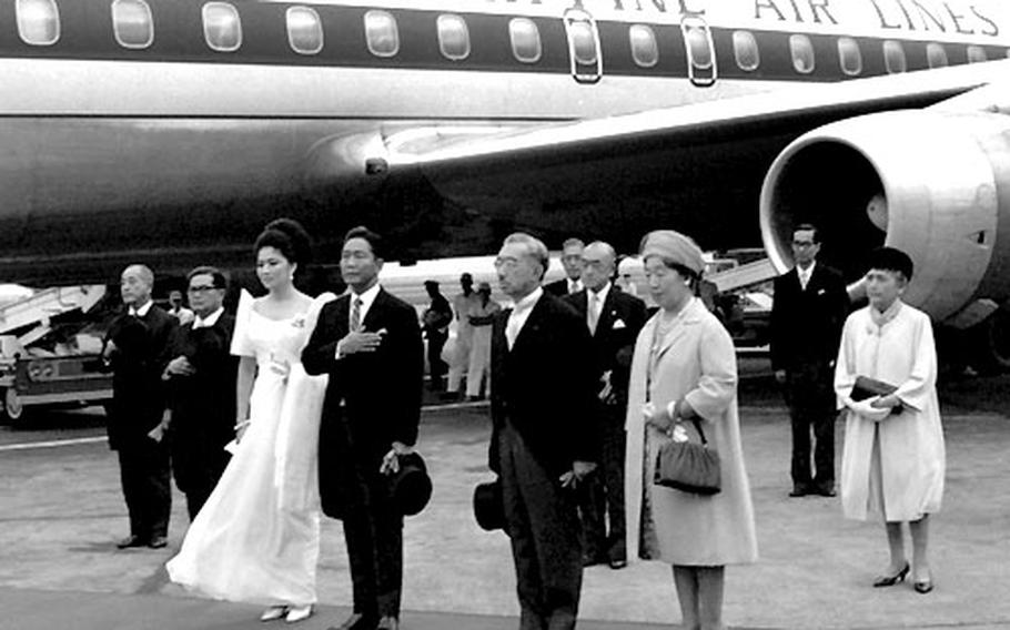 Philippine President Ferdinand Marcos and his wife, Imelda,  with Emperor Hirohito and Empress Nagako at a welcoming ceremony in Tokyo in September, 1966.