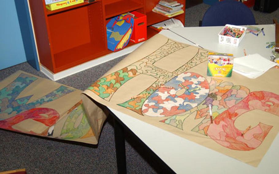 A welcome home banner lies unfinished in the library at Bad Nauheim Elementary School. The banner and others had been prepared by students in anticipation of next month&#39;s return of 1st Armored Division troops.