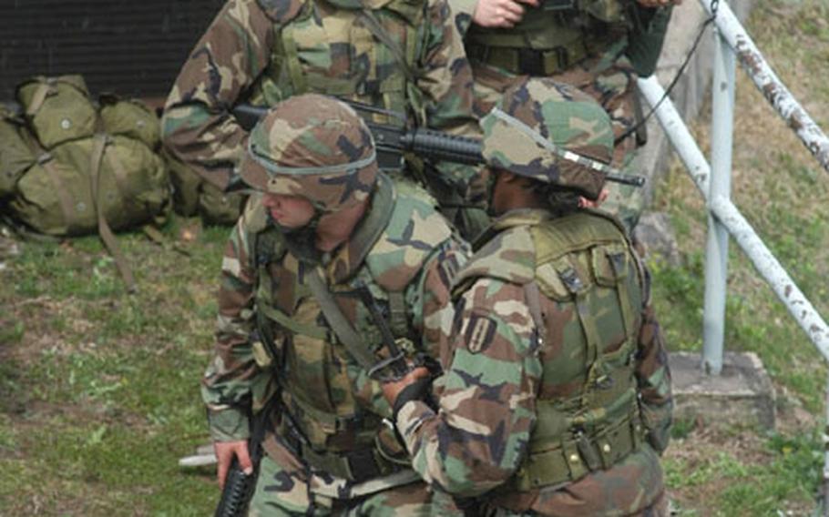 Soldiers with the 362nd Signal Company practiced base defense Monday with other basic soldiering skills at Madison Site, a microwave signal relay site on top of Kwangyo Mountain near Suwon. Madison Site is one of the last U.S. "manned hilltops" in South Korea.