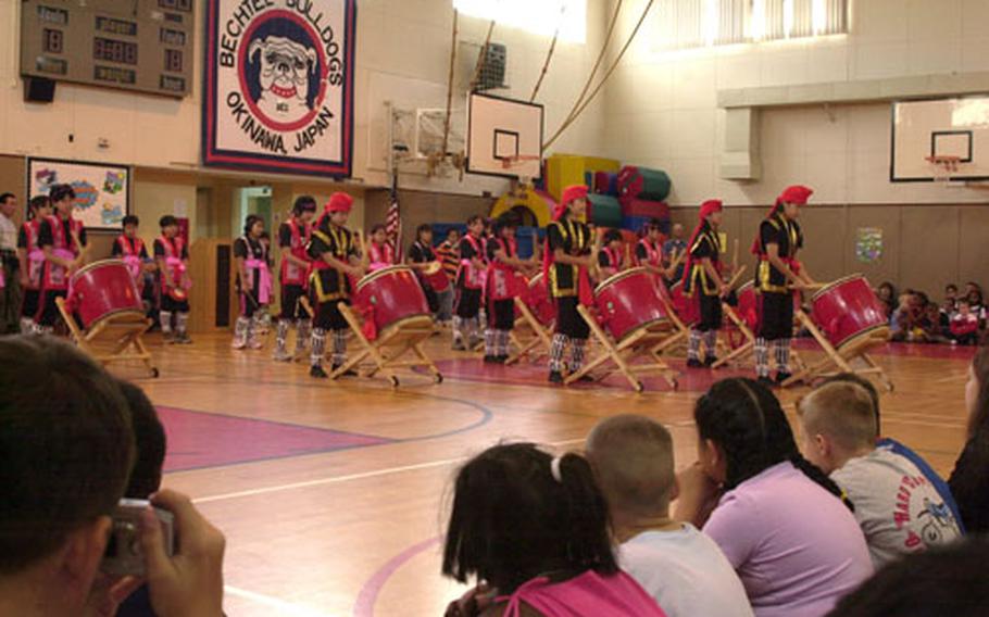 The Mihoso Taiko Drummers perform for students at Bechtel Elementary School.