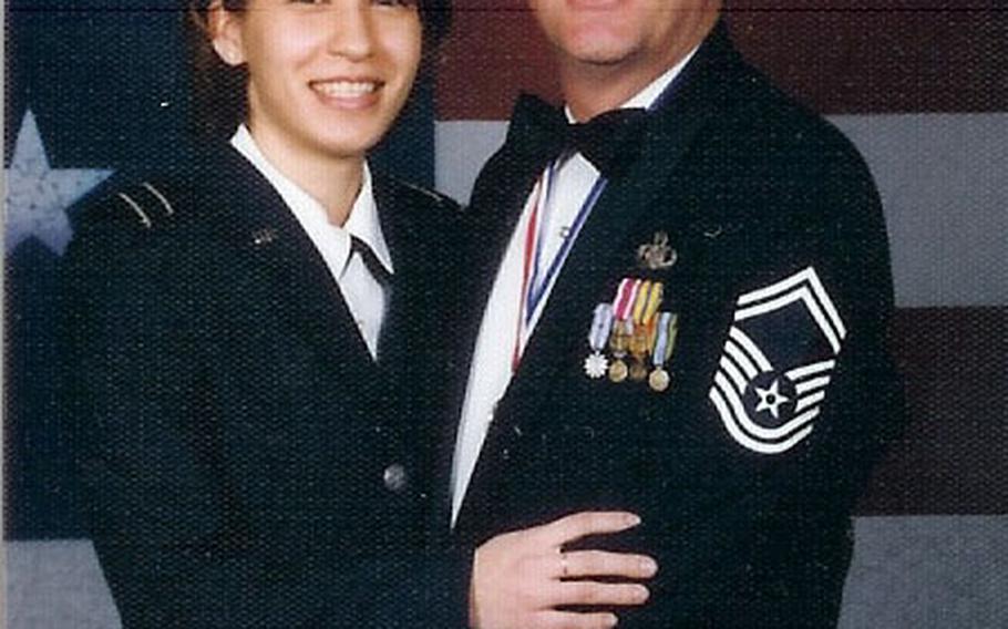 Chief Master Sgt. Brett E. Allison and his daughter - pictured here in her Air Force JROTC uniform - Sherry Allison, at the elder Allison&#39;s chief induction ceremony. By applying to become a public notary, the chief master sergeant gets to commission his daughter as an officer into the Air Force next month in Wisconsin.