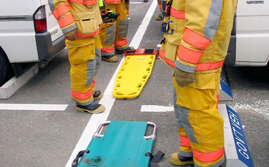 During the Navy Branch Medical Clinic&#39;s annual mass casualty drill, the Sasebo firefighters served for the first time as emergency medical first responders in a large-scale training exercise. The firefighters conduct basic emergency medical stabilization and triage until the more thoroughly trained medical clinic personnel arrive and assume responsibility.