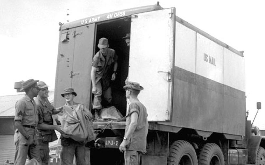 Mail is unloaded from the 41st's truck, known as the "Dear John Express."