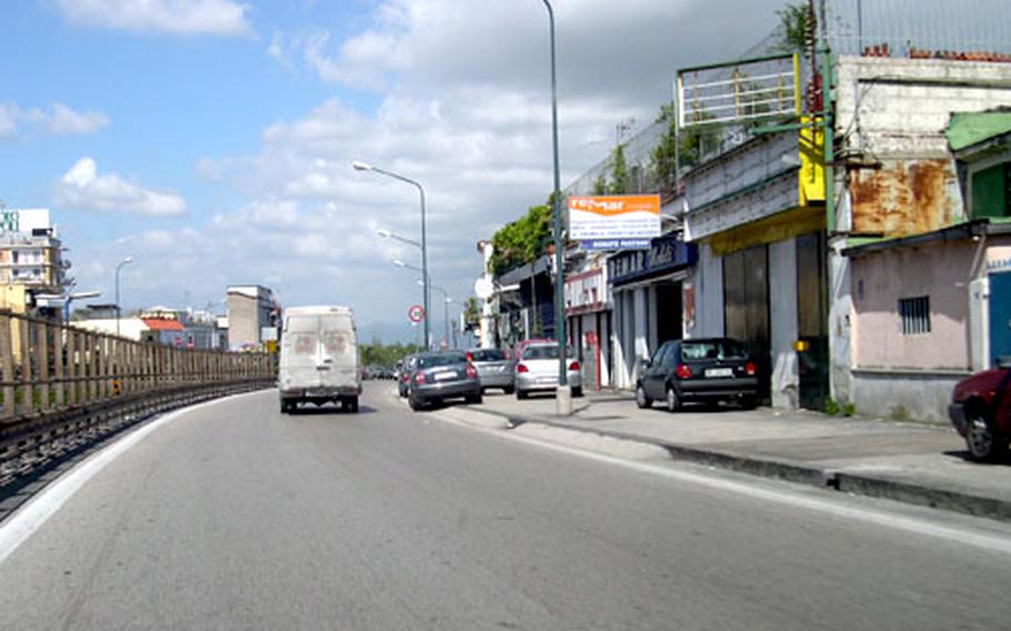 On weekends, flower vendors line the side of this road, on the main route from the Capodichino main gate to the support site housing area in Naples, Italy. It was along this road late last year that men attempted to enter Petty Officer 2nd Class Eric Brown’s car. As he sped away, Brown saw a man lying on the side of the road covered in blood. A survey of Neapolites shows residents believe crime is the city’s biggest problem.