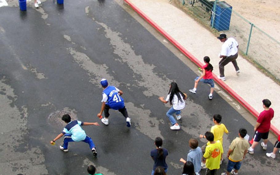 Sasebo Elementary School pupils were spread throughout the physical education and recreation facilities on Wednesday during the 2004 Field Day at the Sasebo Naval Base school.