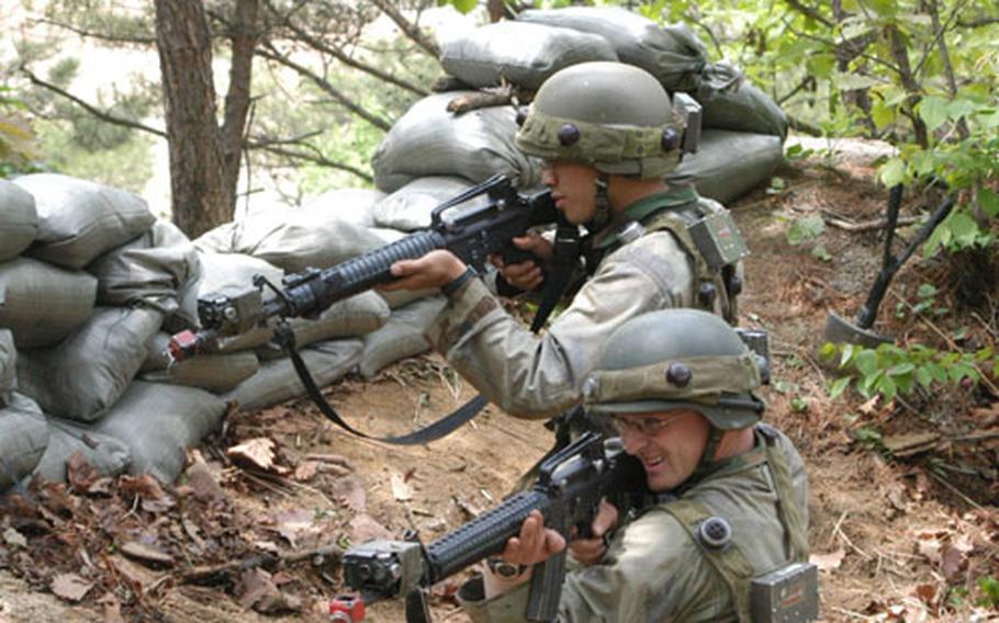 Opposition Force soldiers fight soldiers from 3rd Platoon, B Company, 2-9 Infantry Regiment in Warrior Valley.