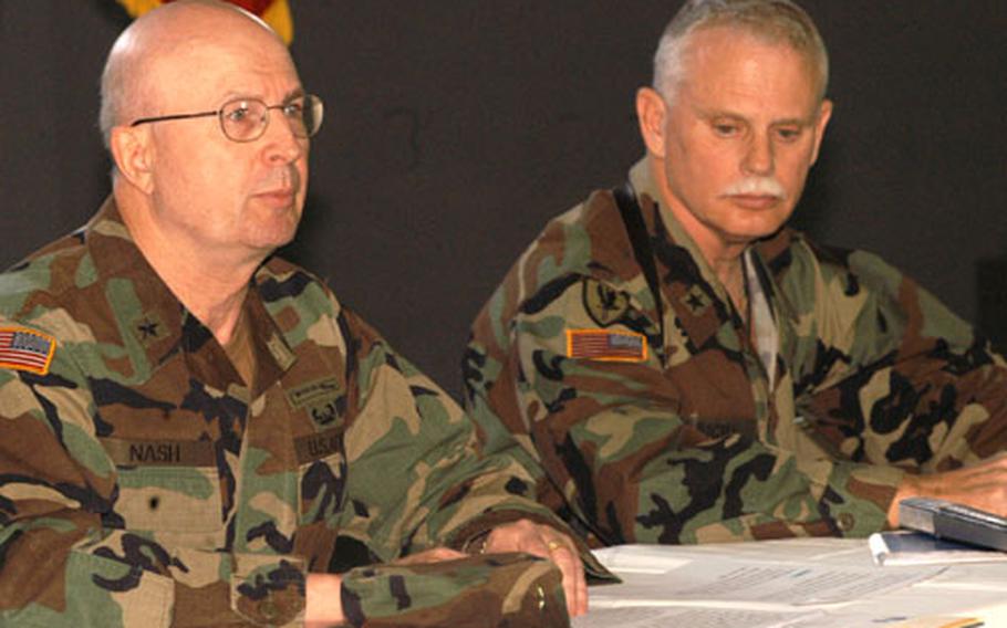 Brig. Gen. Richard Nash of the 34th Infantry Division, Minnesota National Guard, left, and Brig. Gen. Timothy Wright of 35th Infantry Division of Indiana National Guard at a press conference at Eagle base in April. Nash was the commanding officer who approved the sentence for Command Sgt. Maj. Stephen Rannenberg, who pleaded guilty to several counts of sexual harassment.