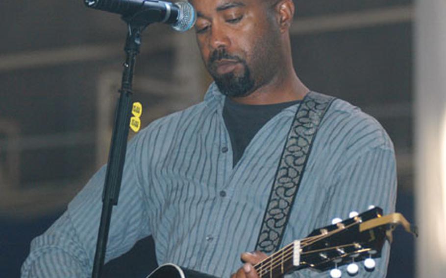 Darius Rucker, lead singer for Southern pop rock band Hootie and The Blowfish, rehearses at Misawa Air Base, Japan, Friday afternoon for the evening&#39;s concert.