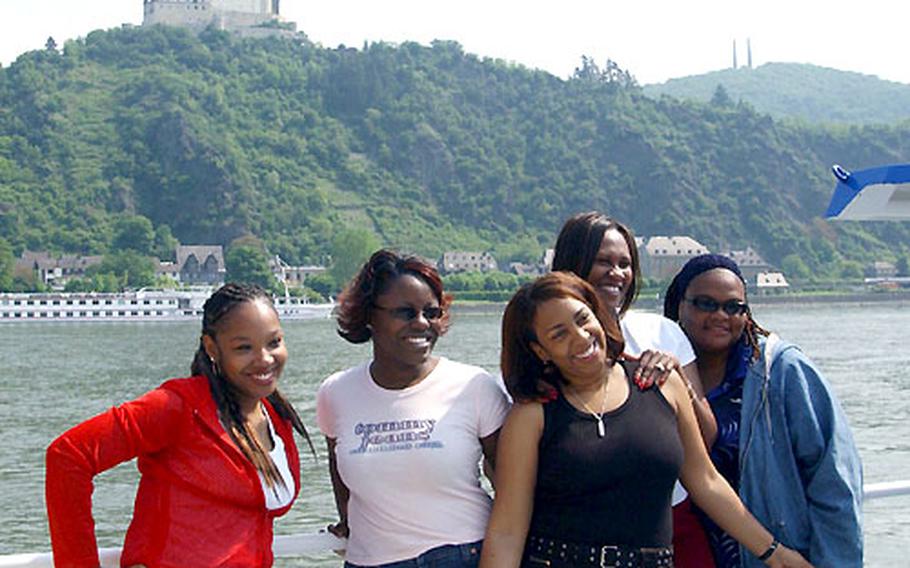 Risa Knight, Matilda Adams, Shelly Feathers, Camille Jackson and Tanya Brown pose for a picture in front of Marksburg Castle during a free Rhine River cruise for Baumholder military spouses and family members on Tuesday.