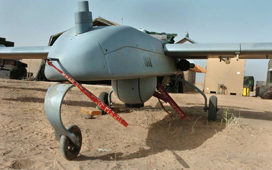 One of four new Tactical Unmanned Aerial Vehicles acquired by the 1st Infantry Division stands ready for a test flight at Forward Operating Base Remagen, Iraq on May 10. The design and color conceals the vehicle during flight.