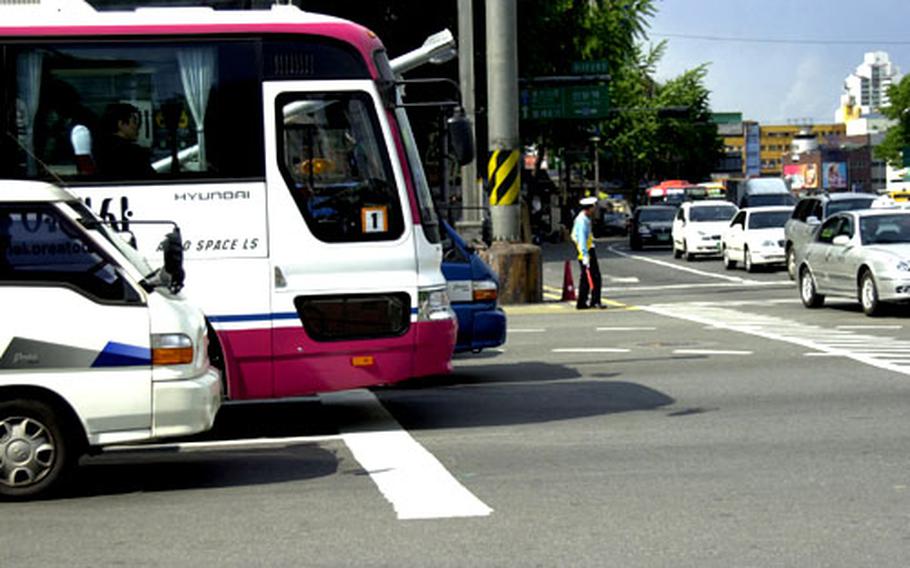 Beginning June 1, if your vehicle is over the white line at an intersection in Seoul, you will face an immediate fine.