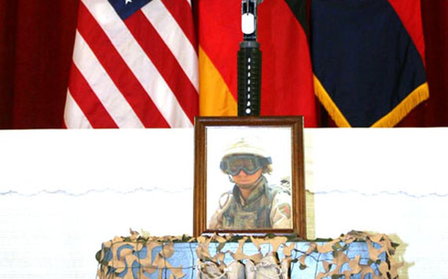 A memorial display for Spc. Michael Campbell sits in front of the chapel in Schweinfurt, Germany, on Wednesday. Campbell was killed in Iraq on May 19.