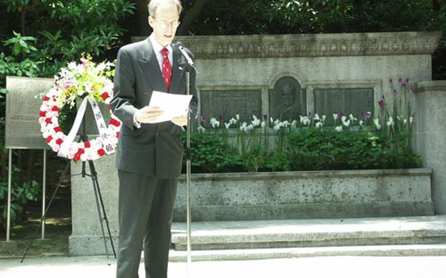 Mark J. Davidson, the Cultural Affairs Officer for the U.S. Embassy in Tokyo, reads a message from U.S. Ambassador to Japan Howard H. Baker, at a commemoration ceremony of the 125th anniversary of 18th American President Gen. Ulysses S. Grant&#39;s visit in Japan on Friday.