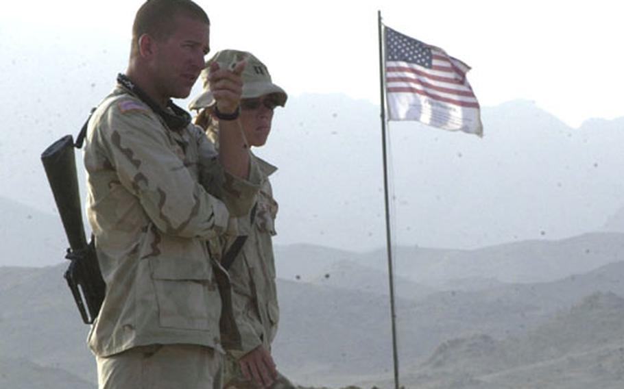A contingent of combat engineers from the New York National Guard have staked an American flag with the names of each victim killed in the 9-11 attacks written on it at a new road-building outpost deep inside the Taliban heartland in Afghanistan.