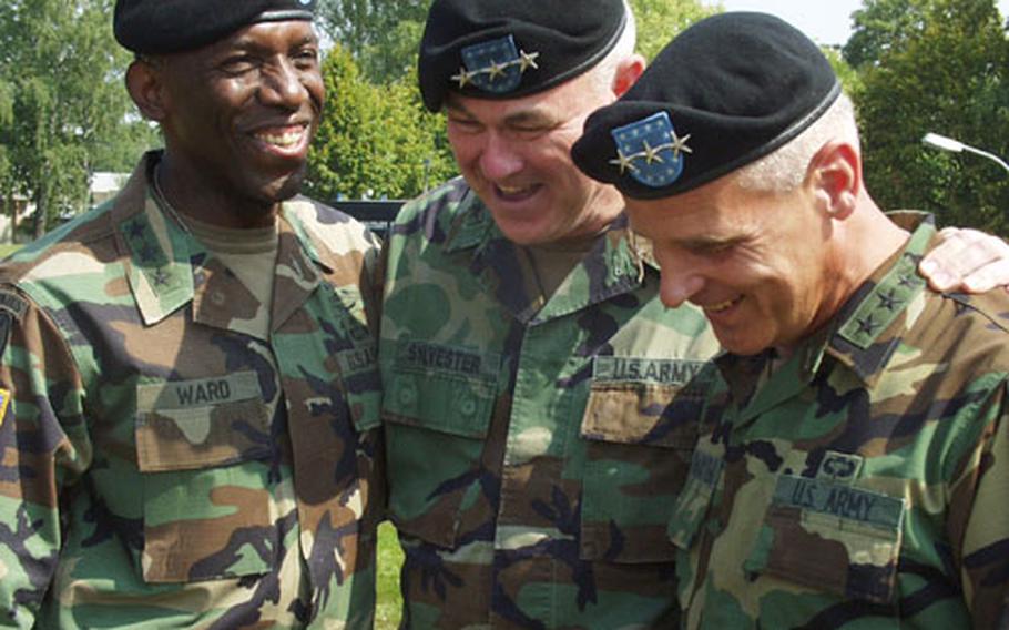 From left, Army Lt. Gens. William E. Ward, John Sylvester and Colby Broadwater III share a laugh Monday after an award and departure ceremony for Sylvester at Patch Barracks in Stuttgart, Germany.