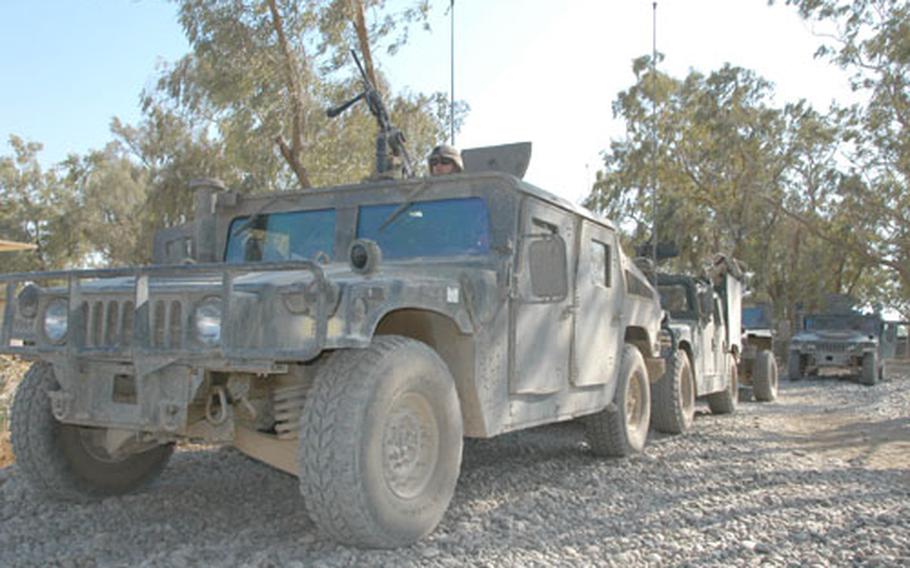 The "Renegades" from 3rd Platoon, Battery B, 1st Battalion, 6th Field Artillery Regiment, roll out on a convoy Tuesday from Forward Operating Base Gabe in Baqouba, Iraq.