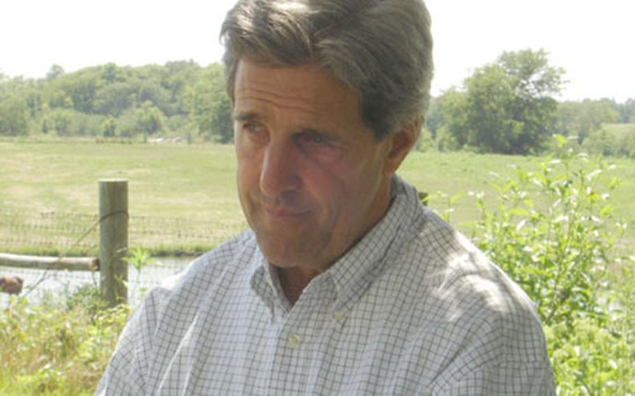 Democratic presidential candidate John Kerry talks with Stars and Stripes Friday at Jim and Ruth Nelson’s farm in Smithville, Mo., during the Kerry-Edwards "Believe in America" tour.