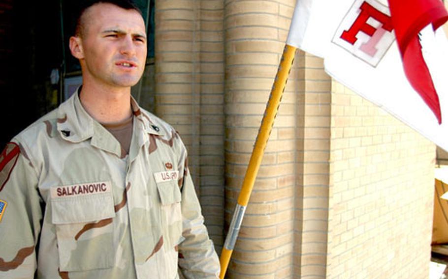 Staff Sgt. Adin Salkanovic of F Troop, 9th Cavalry, in front of the unit&#39;s headquarters at Camp Grey Wolf in Baghdad&#39;s International Zone.