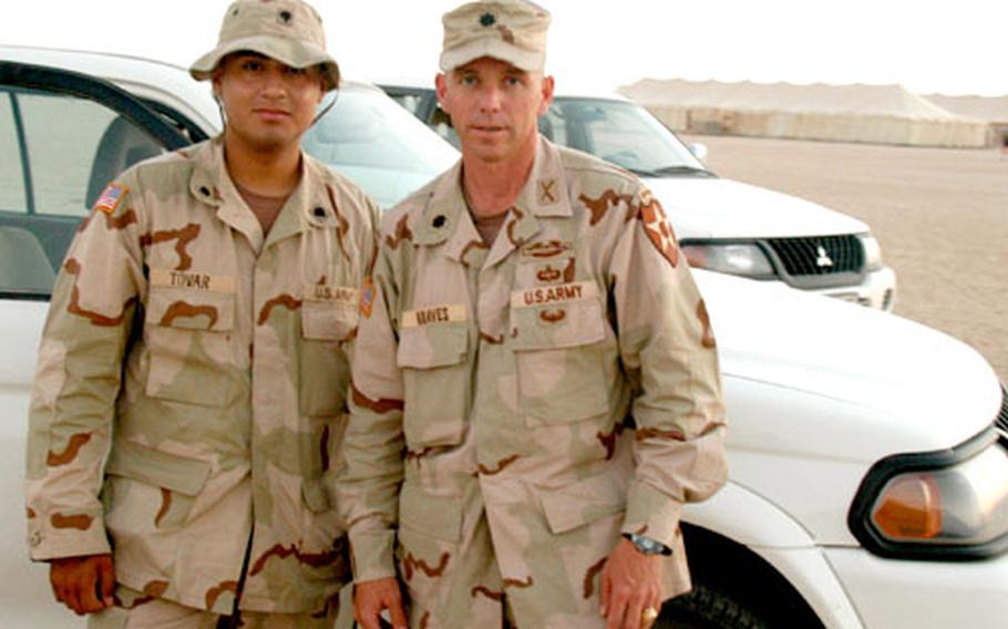 Strikeforce driver Spc. Rigoberto Tovar, left, aims to bring back his leader, Lt. Col. Thomas Graves, safely home from Iraq.