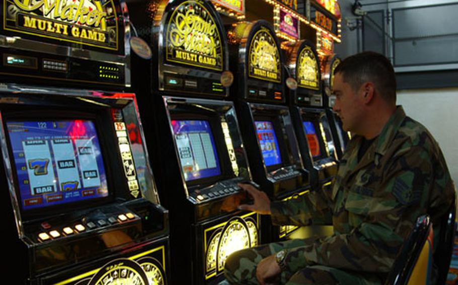 Air Force Staff Sgt. John McCullough tries to add to his winnings at the new Ramstein Air Base Enlisted Club. The club officially opened Thursday.