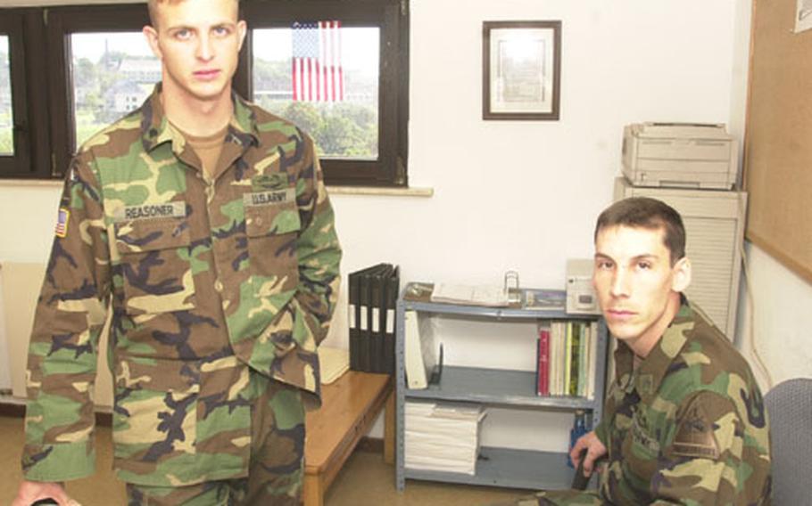 Spc. Joshua Reasoner, left, and Staff Sgt. Eric Knott in Knott&#39;s office at battalion headquarters.