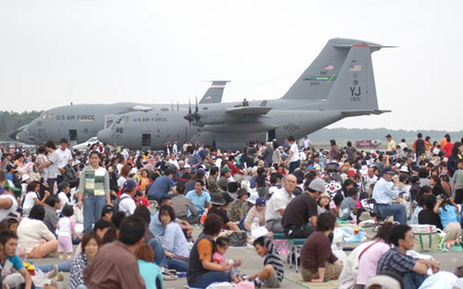 About 200,000 people were expected at Sunday’s annual Misawa Air Festival, hosted by the U.S. Air Force and Japan Air Self-Defense Force. It’s one of the largest air shows in northern Japan. Due to low cloud cover, most of the high-flying aerial demonstrations were canceled or modified but more than 40 U.S. Air Force, Navy and Japan Air Self-Defense Force aircraft lined the south ramp of the runway for visitors to view.
