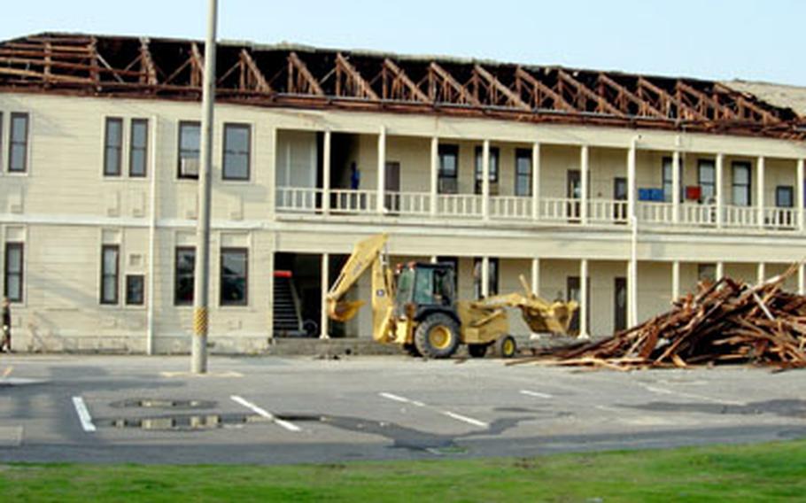 The storm-damaged Logistics Building at Iwakuni Marine Corps Air Station.