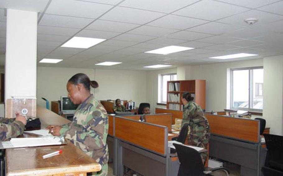 Soldiers of Army&#39;s 176th Finance Battalion at work in a newly-renovated building on Camp Humphreys in South Korea. Base officials will use the three-story former barracks to house a one-stop in- and out-processing center for troops, and for other key "quality-of-life" services that soldiers need.