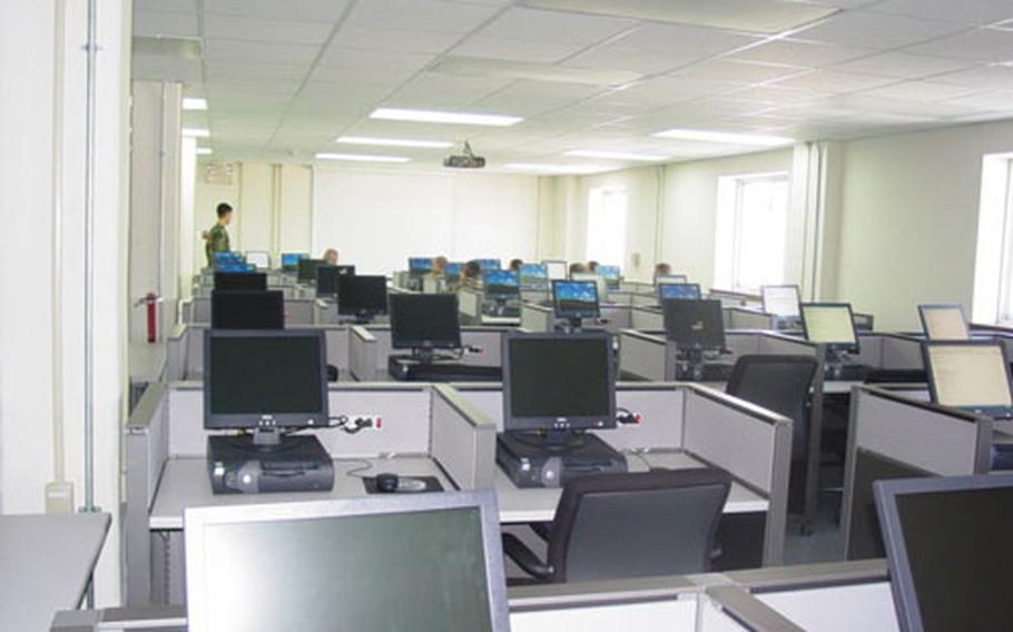 The new "one-stop" in- and out-processing center inside a newly renovated building at Camp Humphreys in South Korea. The center is equipped with 35 computer work stations.