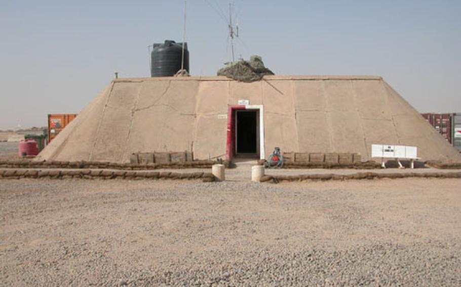 Most of the bunkers at Forward Operating Base McKenzie are used as office space, although some house soldiers. The tank turret on top of this bunker was left here by Saddam Hussein’s military during the war.