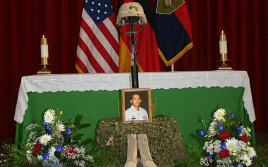 The memorial display for Spc. Edgar Daclan Jr. at a service in the chapel on Ledward Barracks on Wednesday. Daclan, 24, a medic from Cypress, Calif., was killed Sept. 10 in Balad, Iraq, when his patrol responded to indirect fire and was hit by a makeshift bomb.